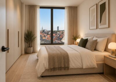 Chambre d'un appartement du projet Palais, avec armoires encastrées et vue sur les toits de Bruxelles